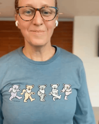 Taylor wearing Grateful Dead Pastel Bears unisex longsleeve T